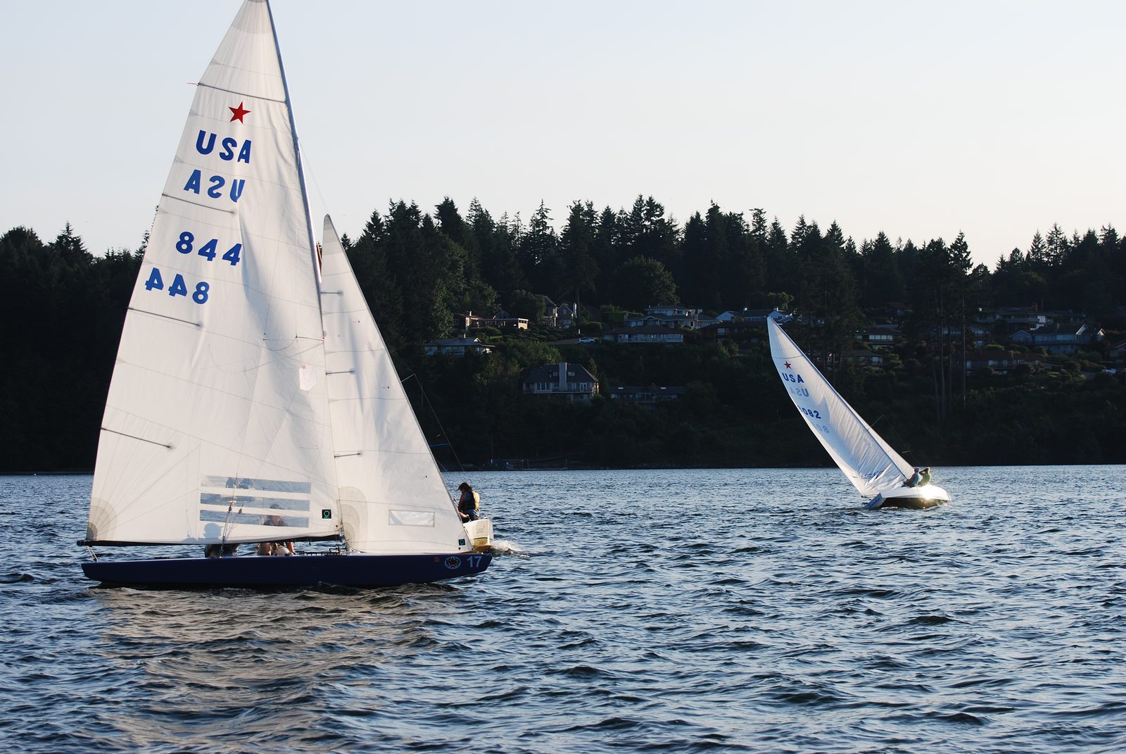 Some heel is fast.  That much heel is not.  Get the boat flat!